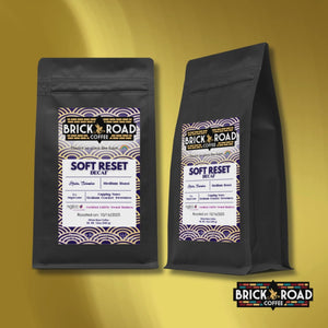 Brick Road Coffee Soft Reset Decaf bag – LGBTQ+ owned inclusive coffee brand Colombian medium roast decaf.
